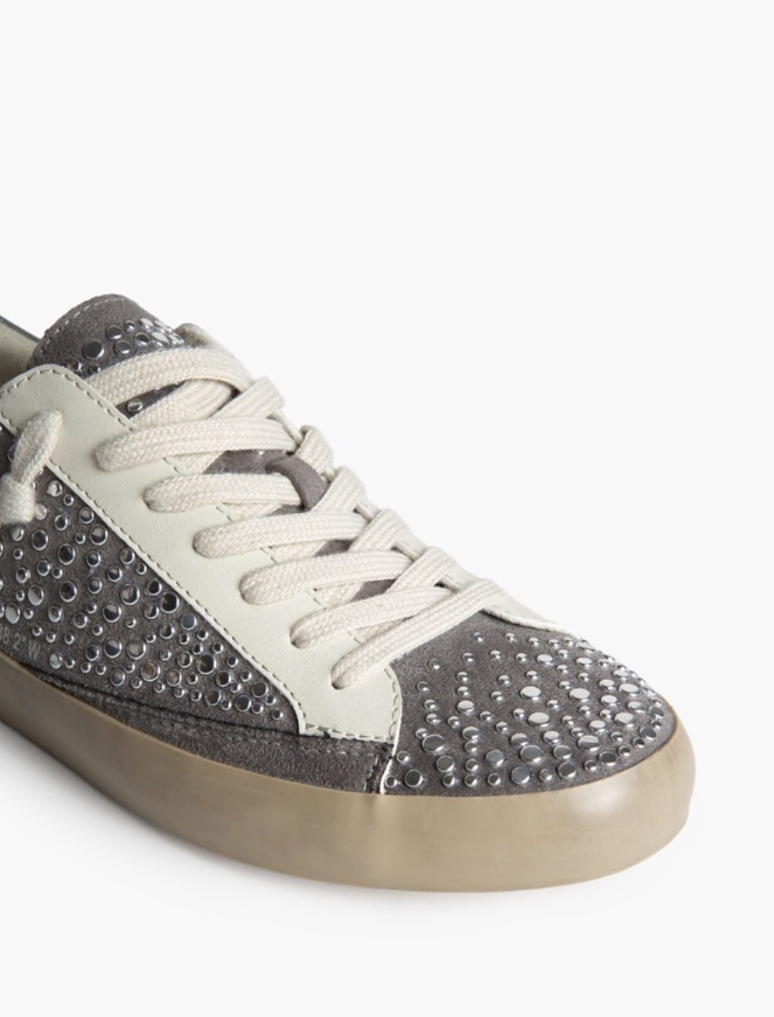 ZAPATILLA GRIS TACHUELAS