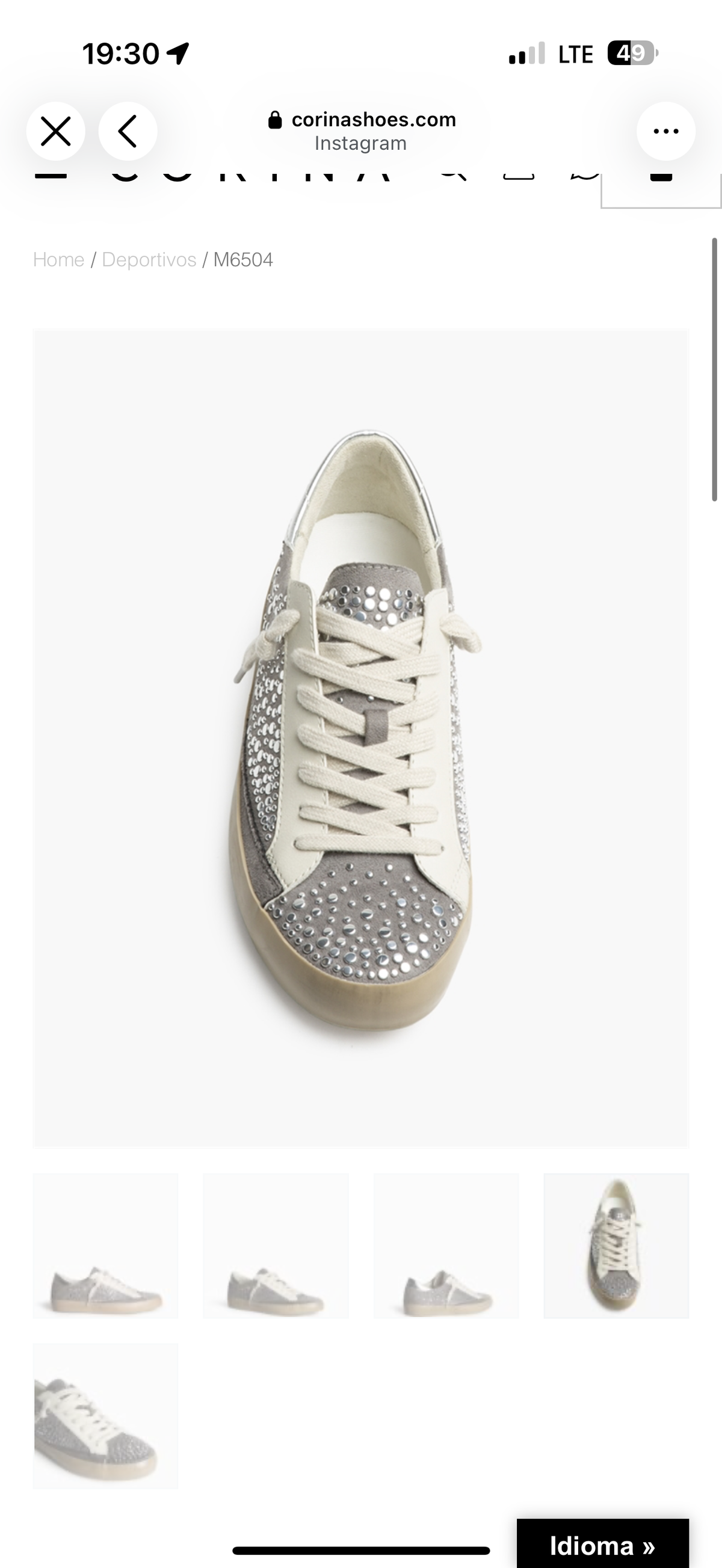ZAPATILLA GRIS TACHUELAS