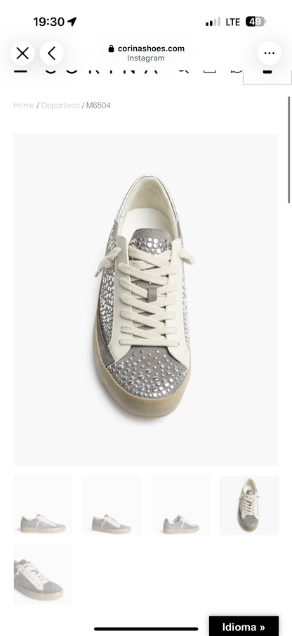 ZAPATILLA GRIS TACHUELAS